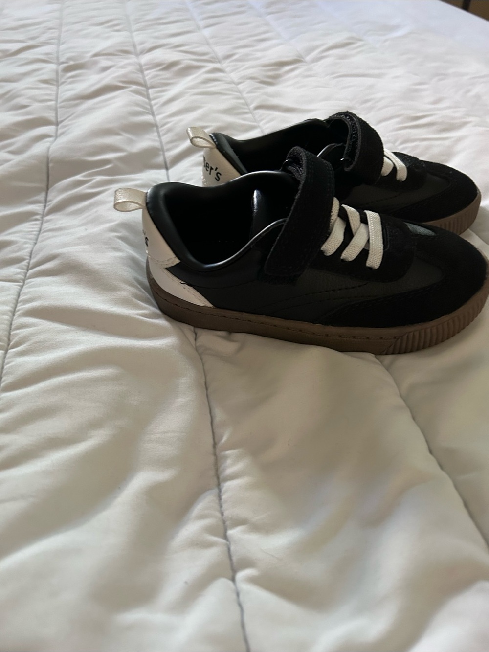 Carter’s Kids Black and White Velcro Sneakers with Gum soles. New never worn.